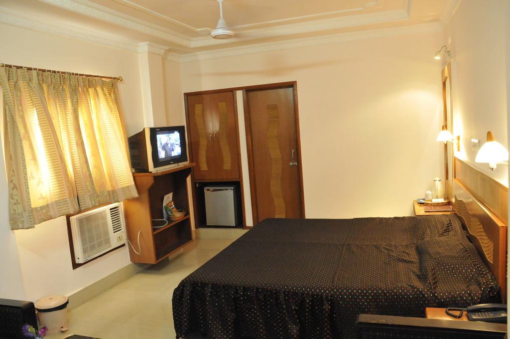 Hotel Heera Kalkutta Zimmer foto
